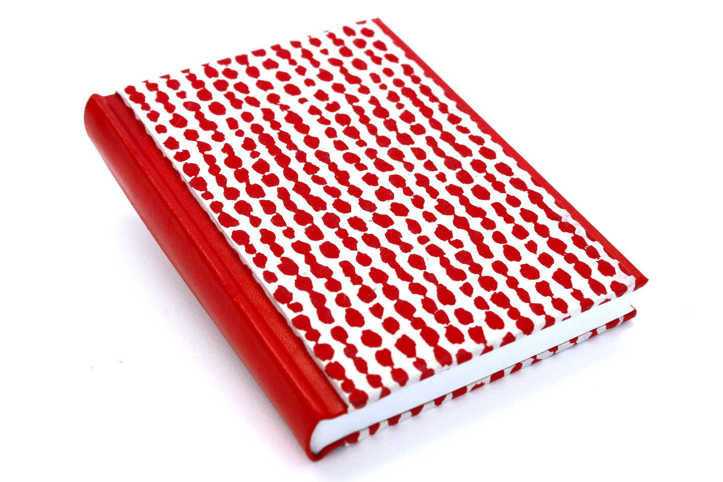 Boek bradel binding papier omslag hand gemaakt leer rood rug voorlijst